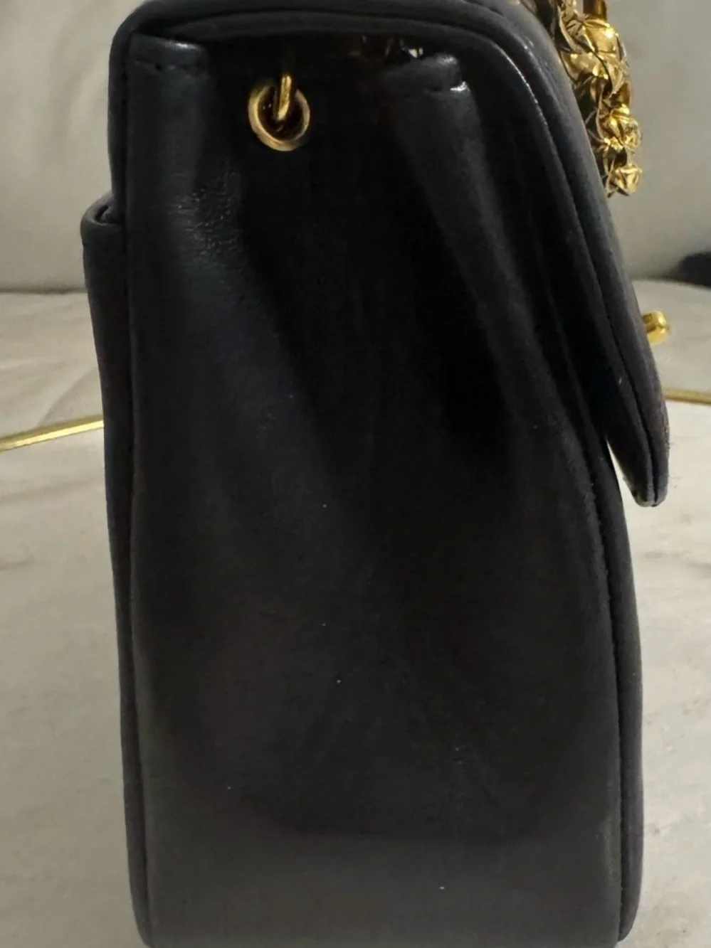 CHANEL Black Vertical Quilted Lambskin Shoulder Bag with Gold Hardware
